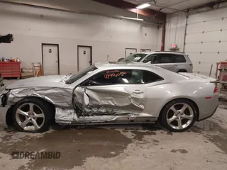 2014 Chevrolet Camaro LT z VIN 2G1FC1E31E9281774, wystawiony jako IAAI lot #41362956 z przebiegiem 144 936 mil mil oraz . Historia ofert i sprzedaży dostępna na DreamBid. Obrazek 14.