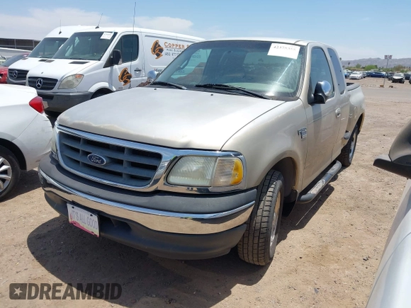 2000 Ford F-150 XL with VIN 1FTRX07W6YKB19703, listed as a IAAI auction lot 42375355 with Not provided miles and . Bid and sale history available at DreamBid. Image 2.