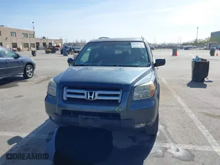 2006 Honda Pilot EX-L with RES with VIN 5FNYF28656B016419, listed as a IAAI auction lot 41620977 with 206,372 mi miles. Bid and sale history available at carsss.com. Image 6.