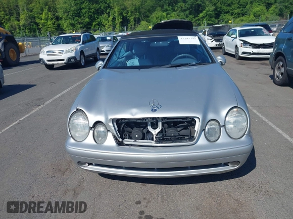 2002 Mercedes-Benz CLK 320/430 z VIN WDBLK70G12T129233, wystawiony jako IAAI lot #42391247 z przebiegiem 94 186 mil mil oraz . Historia ofert i sprzedaży dostępna na DreamBid. Obrazek 12.