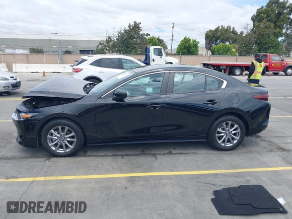 2021 Mazda 3 S with VIN 3MZBPAAL8MM254767, listed as a IAAI auction lot 42813614 with 31,704 mi miles and . Bid and sale history available at DreamBid. Image 14.
