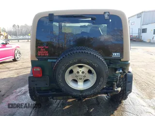 2001 Jeep Wrangler Sport with VIN 1J4FA49S71P315061, listed as a IAAI auction lot 41525441 with 178,809 mi miles. Bid and sale history available at carsss.com. Image 16.