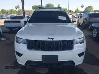 2018 Jeep Grand Cherokee Laredo E with VIN 1C4RJFAG5JC303228, listed as a IAAI auction lot 42375212 with 98,155 mi miles and . Bid and sale history available at DreamBid. Image 12.