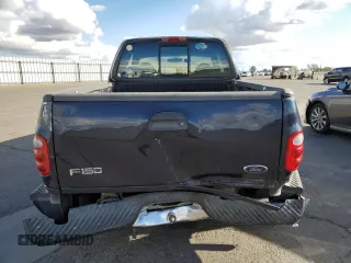 2000 Ford F-150 with VIN 1FTRX07W3YKA56561, listed as a Copart auction lot 81149654 with 185,967 mi miles and Salvage title. Bid and sale history available at DreamBid. Image 6.