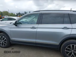 2021 Volkswagen Tiguan SE with VIN 3VV3B7AX0MM008809, listed as a IAAI auction lot 42077986 with 70,780 mi miles and . Bid and sale history available at DreamBid. Image 14.