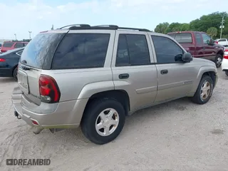 2002 Chevrolet TrailBlazer LTZ with VIN 1GNDS13S422222859, listed as a IAAI auction lot 42001726 with 288,530 mi miles. Bid and sale history available at carsss.com. Image 4.