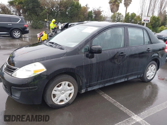 2011 Nissan Versa 1.8 S with VIN 3N1BC1AP7BL368816, listed as a IAAI auction lot 41794835 with 198,801 mi miles. Bid and sale history available at carsss.com. Image 2.