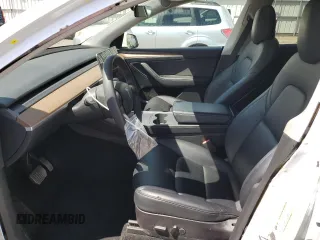 2022 Tesla Model Y Long Range with VIN 7SAYGAEE4NF534588, listed as a Copart auction lot 53274995 with 20,768 mi miles and Salvage Title. Bid and sale history available at DreamBid. Image 7.