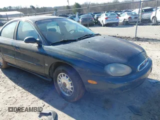 1998 Mercury Sable LS Premium Group z VIN 1MEFM53S0WA638842, wystawiony jako IAAI lot #41557457 z przebiegiem 153 443 mil mil oraz . Historia ofert i sprzedaży dostępna na DreamBid. Obrazek 1.