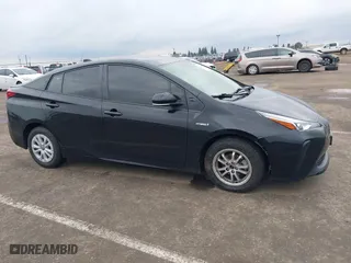 2022 Toyota Prius L Eco with VIN JTDKAMFU8N3188361, listed as a IAAI auction lot 41726369 with 48,517 mi miles. Bid and sale history available at carsss.com. Image 13.