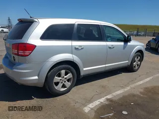 2009 Dodge Journey SXT with VIN 3D4GG57V19T211770, listed as a IAAI auction lot 42095045 with 164,610 mi miles. Bid and sale history available at carsss.com. Image 4.