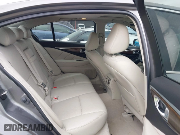 2015 Infiniti Q50 Premium z VIN JN1BV7AR7FM408015, wystawiony jako IAAI lot #42083301 z przebiegiem 58 817 mil mil oraz . Historia ofert i sprzedaży dostępna na DreamBid. Obrazek 8.