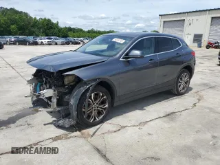 2020 BMW X2 sDrive28i with VIN WBXYH9C07L5N97427, listed as a Copart auction lot 56324745 with 76,947 mi miles and Salvage title. Bid and sale history available at DreamBid. Image 1.