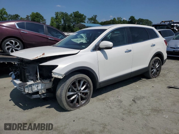 2015 Mazda CX-9 Grand Touring z VIN JM3TB2DA3F0452160, wystawiony jako Copart lot #60220655 z przebiegiem 145 185 mil mil oraz Szkoda całkowita • Salvage title. Historia ofert i sprzedaży dostępna na DreamBid. Obrazek 1.