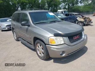 2003 GMC Envoy SLE z VIN 1GKDT13S432189177, wystawiony jako IAAI lot #42266681 z przebiegiem 176 259 mil mil oraz . Historia ofert i sprzedaży dostępna na DreamBid. Obrazek 1.
