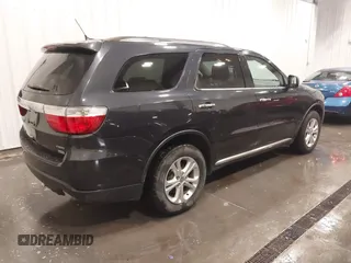 2013 Dodge Durango Crew with VIN 1C4RDJDGXDC691311, listed as a IAAI auction lot 41642267 with 167,098 mi miles and . Bid and sale history available at DreamBid. Image 4.