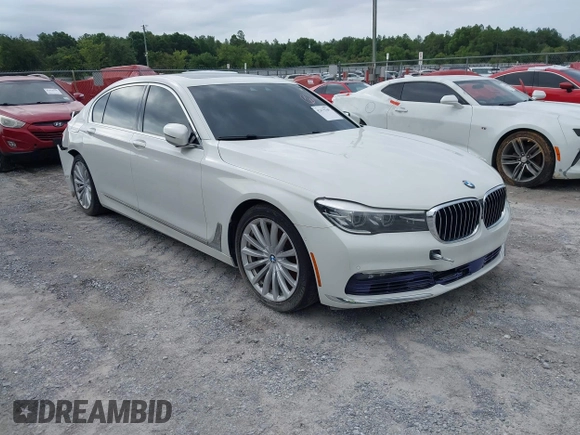 2017 BMW 7 Series 740i z VIN WBA7E2C53HG740273, wystawiony jako IAAI lot #42475769 z przebiegiem Nie podano mil oraz . Historia ofert i sprzedaży dostępna na DreamBid. Obrazek 1.