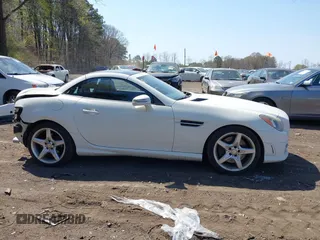 2012 Mercedes-Benz SLK 350 z VIN WDDPK5HA2CF040431, wystawiony jako IAAI lot #42066002 z przebiegiem 98 016 mil mil oraz . Historia ofert i sprzedaży dostępna na DreamBid. Obrazek 14.