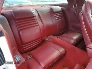 1978 Pontiac Firebird z VIN 2U87K8L123850, wystawiony jako Copart lot #79076374 z przebiegiem 64 829 mil mil oraz Szkody całkowita. Historia ofert i sprzedaży dostępna na DreamBid. Obrazek 10.