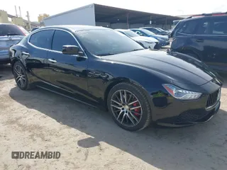 2015 Maserati Ghibli z VIN ZAM57XSA9F1146055, wystawiony jako IAAI lot #41814633 z przebiegiem 88 783 mil mil oraz . Historia ofert i sprzedaży dostępna na DreamBid. Obrazek 1.