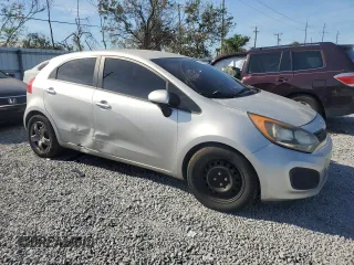 2014 Kia Rio LX with VIN KNADM5A30E6367851, listed as a Copart auction lot 84300514 with 181,083 mi miles and Clean Title. Bid and sale history available at carsss.com. Image 4.