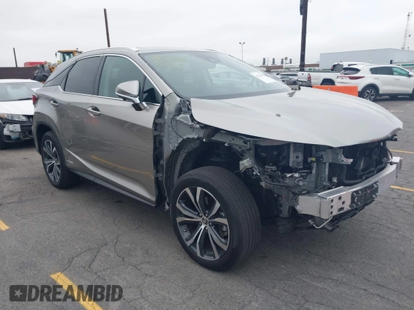 2021 Lexus RX 450h with VIN 2T2HGMDA3MC060208, listed as a IAAI auction lot 42163455 with 34,167 mi miles and . Bid and sale history available at DreamBid. Image 1.