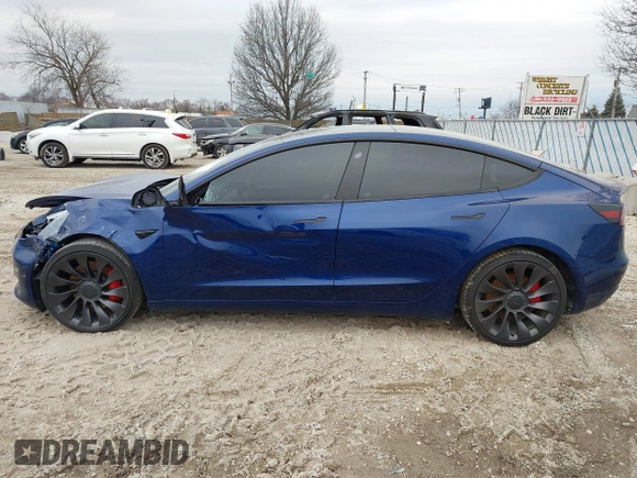 2021 Tesla Model 3 Performance with VIN 5YJ3E1EC6MF996743, listed as a IAAI auction lot 41509631 with 41,599 mi miles and . Bid and sale history available at DreamBid. Image 14.