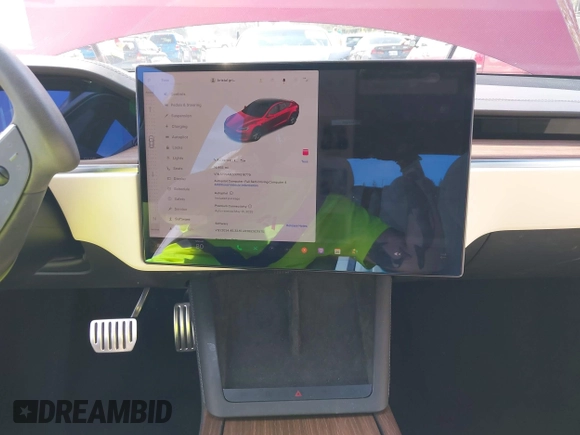 2023 Tesla Model S with VIN 5YJSA1E5XPF516779, listed as a IAAI auction lot 42110737 with 16,465 mi miles and . Bid and sale history available at DreamBid. Image 19.