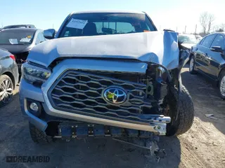 2022 Toyota Tacoma 4WD SR with VIN 3TYCZ5ANXNT077526, listed as a IAAI auction lot 41597014 with 71,103 mi miles. Bid and sale history available at carsss.com. Image 13.