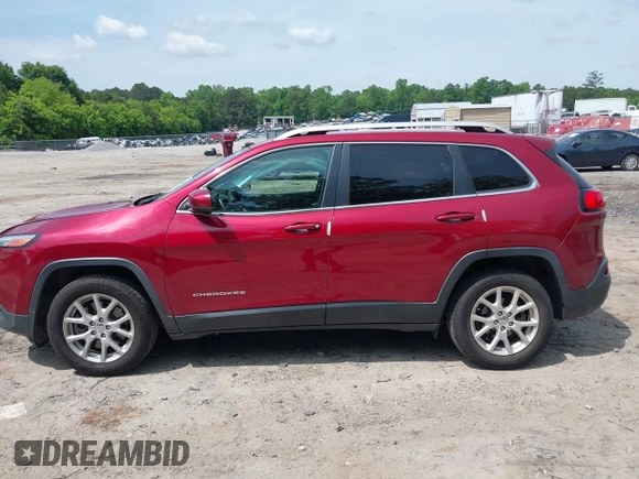 2016 Jeep Cherokee Latitude with VIN 1C4PJLCB8GW320099, listed as a IAAI auction lot 42236076 with 186,000 mi miles and . Bid and sale history available at DreamBid. Image 14.