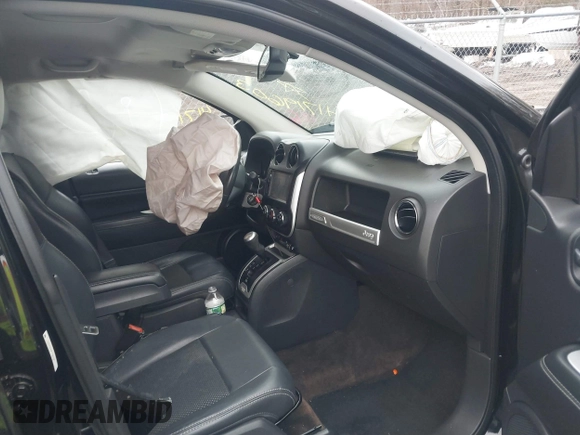 2015 Jeep Compass Latitude with VIN 1C4NJDEB3FD105704, listed as a IAAI auction lot 41719603 with 106,904 mi miles. Bid and sale history available at carsss.com. Image 5.