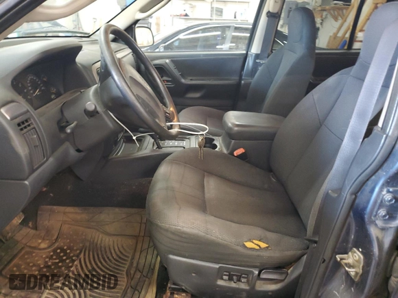 2004 Jeep Grand Cherokee Laredo with VIN 1J4GW48S24C294185, listed as a Copart auction lot 53357945 with 209,169 mi miles and Clean Title. Bid and sale history available at carsss.com. Image 7.