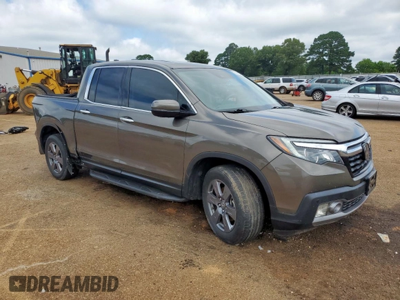 2020 Honda Ridgeline RTL-E with VIN 5FPYK3F79LB001891, listed as a Copart auction lot 58569255 with 34,513 mi miles and Salvage title. Bid and sale history available at DreamBid. Image 4.