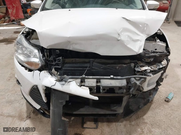 2012 Ford Focus SE with VIN 1FAHP3F24CL313957, listed as a IAAI auction lot 41368553 with 113,610 mi miles. Bid and sale history available at carsss.com. Image 6.
