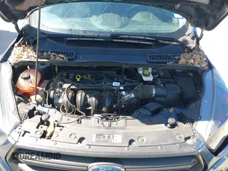 2018 Ford Escape S with VIN 1FMCU0F74JUC86298, listed as a IAAI auction lot 41765086 with 124,154 mi miles. Bid and sale history available at carsss.com. Image 10.
