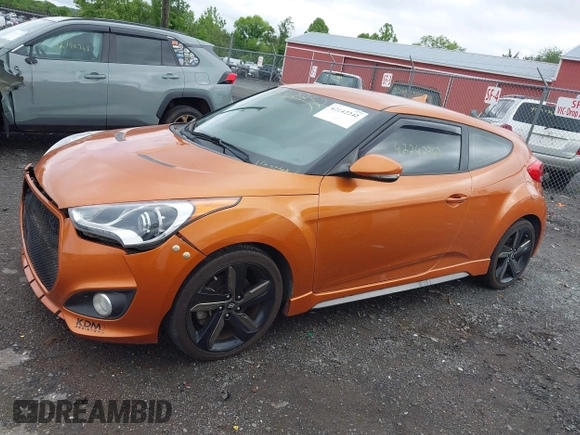 2013 Hyundai Veloster Turbo z VIN KMHTC6AE3DU124744, wystawiony jako IAAI lot #42242242 z przebiegiem 115 757 mil mil oraz . Historia ofert i sprzedaży dostępna na DreamBid. Obrazek 14.
