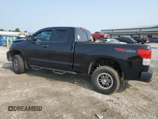 2012 Toyota Tundra with VIN 5TFUW5F10CX213930, listed as a Copart auction lot 60213445 with 147,371 mi miles and Salvage title. Bid and sale history available at DreamBid. Image 2.