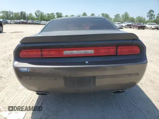 2013 Dodge Challenger SXT z VIN 2C3CDYAG6DH554175, wystawiony jako Copart lot #52185285 z przebiegiem 99 036 mil mil oraz Szkoda całkowita • Salvage title. Historia ofert i sprzedaży dostępna na DreamBid. Obrazek 6.