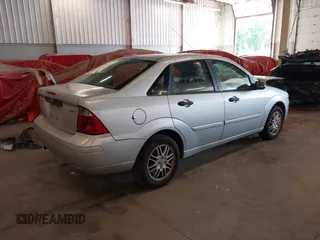 2005 Ford Focus S with VIN 1FAFP34N85W224267, listed as a IAAI auction lot 42349913 with 140,413 mi miles and . Bid and sale history available at DreamBid. Image 4.