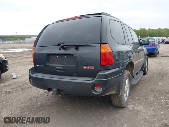2007 GMC Envoy SLE z VIN 1GKDS13S572214421, wystawiony jako IAAI lot #42186747 z przebiegiem Nie podano mil oraz . Historia ofert i sprzedaży dostępna na DreamBid. Obrazek 4.