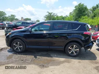 2018 Toyota RAV4 XLE with VIN 2T3WFREV3JW468450, listed as a IAAI auction lot 42528560 with 77,513 mi miles and . Bid and sale history available at DreamBid. Image 14.