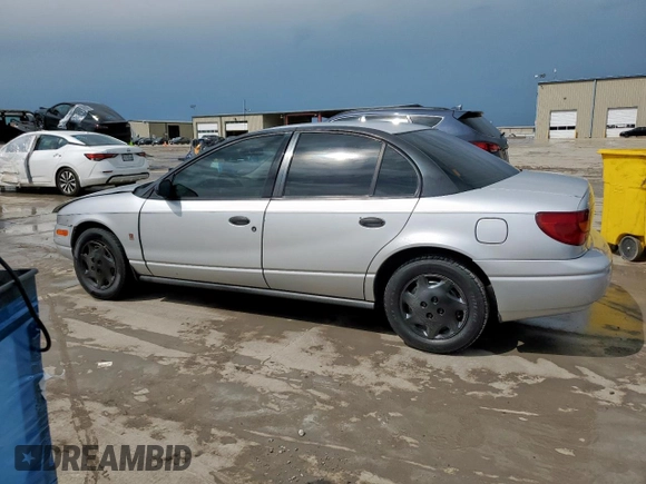 2002 Saturn SL с VIN 1G8ZH52892Z242469, выставлен на аукционе Copart как лот 59973755 с пробегом Не указан миль и Списание • Salvage title. История ставок и продаж доступна на DreamBid. Изображение 2.