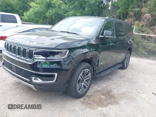 2024 Jeep Wagoneer Series II Carbide with VIN 1C4SJVBP9RS170999, listed as a IAAI auction lot 42140534 with 24,891 mi miles and . Bid and sale history available at DreamBid. Image 2.