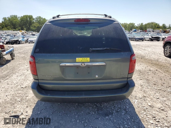 2003 Chrysler Town & Country LX with VIN 2C4GP44L33R162432, listed as a Copart auction lot 69942414 with 153,564 mi miles and Salvage Title. Bid and sale history available at DreamBid. Image 6.