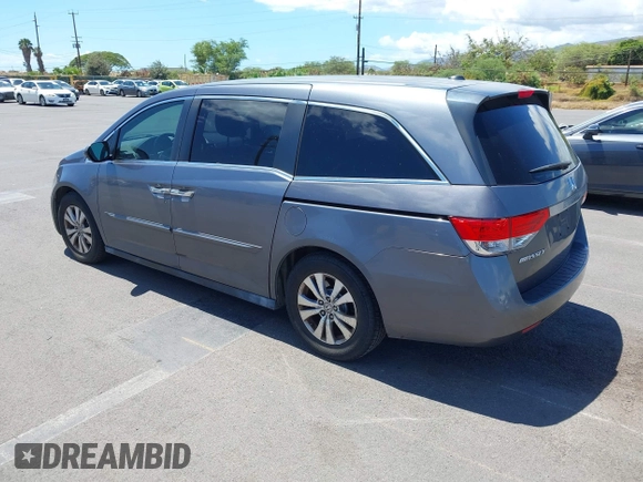 2014 Honda Odyssey EX-L with VIN 5FNRL5H69EB018557, listed as a IAAI auction lot 42855051 with 165,081 mi miles and . Bid and sale history available at DreamBid. Image 3.