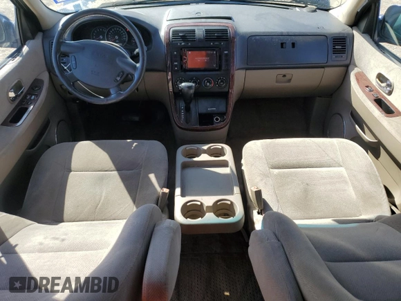 2003 Kia Sedona LX with VIN KNDUP131736409797, listed as a Copart auction lot 46902855 with 142,091 mi miles and Salvage Title. Bid and sale history available at carsss.com. Image 8.