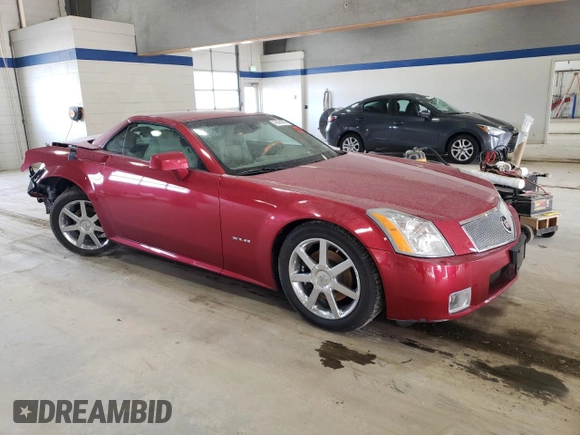 2004 Cadillac XLR z VIN 1G6YV34A045602305, wystawiony jako Copart lot #48484845 z przebiegiem 52 897 mil mil oraz Szkoda całkowita • Salvage title. Historia ofert i sprzedaży dostępna na DreamBid. Obrazek 4.