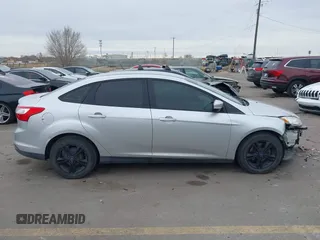 2013 Ford Focus SE with VIN 1FADP3F20DL361469, listed as a IAAI auction lot 41457037 with 127,852 mi miles. Bid and sale history available at carsss.com. Image 13.