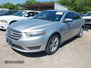 2013 Ford Taurus SEL with VIN 1FAHP2E83DG111766, listed as a IAAI auction lot 42041504 with 158,468 mi miles. Bid and sale history available at carsss.com. Image 2.