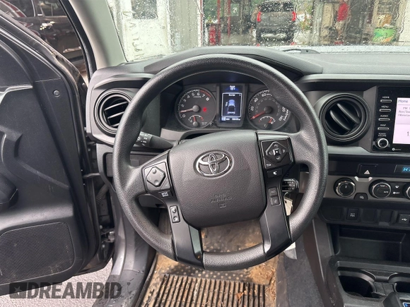 2021 Toyota Tacoma SR z VIN 5TFCZ5AN2MX279975, wystawiony jako IAAI lot #42477503 z przebiegiem 50 690 mil mil oraz . Historia ofert i sprzedaży dostępna na DreamBid. Obrazek 25.